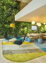 This Living Wall In The Amsterdam Office Of Nuon A Power Company Is A Great Focal Point For The Room I Office Interior Design Office Design Office Interiors