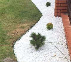 The custom iron door is a standout. Garden Stones Aggregates Decorative Extra White Chippings Naural Marble Gravel Ebay Stone Landscaping Landscaping With Rocks Garden Stones