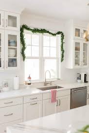 In a new york city townhouse designed by eve robinson associates, purple patterned wallpaper adds a pop of color to a white kitchen design. Christmas Home Tour Living Kitchen Christmas Decor Chrissy Marie Blog