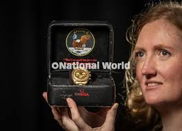 39935478-Harriet Hunter-Smart at Tennants Auctioneers with the Omega 18  Carat Gold Limited Edition Chronograph Wristwatch To Commemorate the Apollo  XI Moon Landing for sale at the Fine Jewellery, Wat