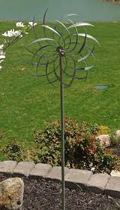 Maybe you would like to learn more about one of these? Windswept Kinetic Sculpture Metal Construction Consists Of Two Sides Spinning In Opposite Directions Creating Garden Wind Spinners Garden Art Wind Spinners