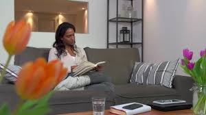 For the best present for wife. Husband Giving Wife Birthday Present Anniversary Gift Surprise On Sofa Video By C Dualstock Stock Footage 106251326
