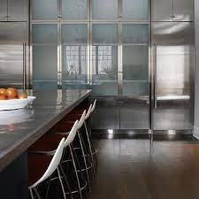 The door is opened by sliding the handles. Frosted Glass Kitchen Cabinets Design Ideas