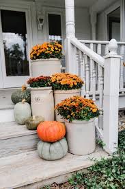 Cozy Rustic Fall Porch Mums In Crocks To Give A Farmhouse Porch An Instant Fall Vibe Great S Rustic Fall Porch Fall Decorations Porch Fall Decor Inspiration