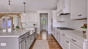 White subway tile backsplash white shaker cabinets and stainless steel appliances. White Shaker Kitchen Cabinets With White Subway Tile Backsplash Youtube