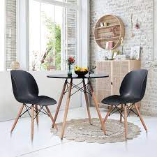Modern kitchen with glass round table on wood. Carson Carrington Sabyholm Modern Round Kitchen Dining Table On Sale Overstock 28045674