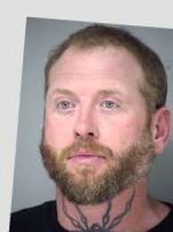 Aryan Brotherhood of Texas member sentenced to 50 years for fatally  stabbing his wife at bar