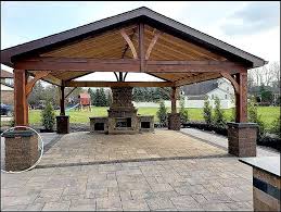 In this photo, the stamped concrete patio looks convincingly like natural stone. Stone Decorative Fire Pits Fireplaces Somerset Patios Concrete Stamped Concrete Patios Driveways Rochester Ny