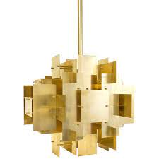 The jonathan adler puzzle table lamp alternately references design elements associated with '60s modernism and '70s italian. Puzzle Chandelier Jonathan Adler