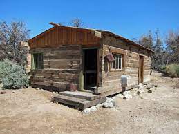 4x8 beams running lengthwise 18 feet of your 12x18 set just on concrete trailer house blocking solid 16x16 might be sufficient and set 0, 6,12 feet. Hiking Around Las Vegas Desert Nwr Corn Creek Railroad Tie Cabin