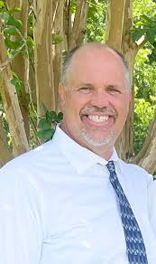 Seneca's Holman resigns post