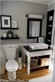 Pops of bright yellow help to break up the monochromatic design. Pin On Bathroom Ideas