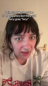 How Is Lucy Gray Related to Lenore Dove