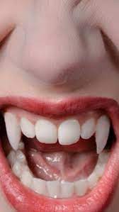 How To Make Vampire Fangs Vampire Fangs Vampire Halloween Costume Vampire Costume Diy