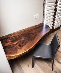 An extremely figured live edge black walnut slab, lovingly sanded and then finished in osmo's very durable satin polyx hard wax oil. Live Edge Desk Wescover