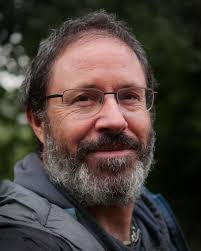 I've been out in the woods for some time, co-running the Mead of Poetry  wilderness fast for eloquence. That's my face for the feed, but also to  show you how happy I
