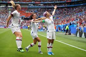 United states women's soccer team players megan rapinoe (left), alex morgan, and carli lloyd stand during the national anthem at a ceremony at city hall in new york city, july 10, 2019. We Have To Be Better Megan Rapinoe And The Year Of Victory And Advocacy The New York Times