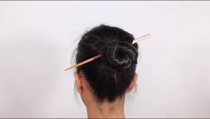 Make different buns and hairstyles easily and quickly. 3 Ways To Put Your Hair Up With Chopsticks Wikihow