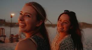 Two women wearing bikinis photo