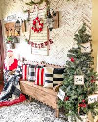 Set your outdoor holiday scene with a mixture of garlands, wreaths and a christmas tree. Impressive Christmas Entryway Decoration Ideas For 2020