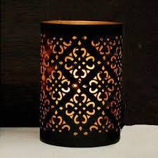 Decorative lanterns create an intimate and cozy vibe for your outdoor space. Decorative Candle Holder With Unique Design And Black Gold Finish Global Sources