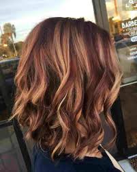 This style is perfect for the lady who loves a little pop of red! Caramel And Red Highlights In Brown Hair Red Highlights In Brown Hair Hair Color Auburn Fall Blonde Hair