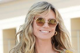 Heidi klum third child (johan riley fyodor taiwo samuel) biography being the third child of her mother heidi and the second child of his father samuel seal, johan riley fyodor taiwo samuel was born in los angeles, california on november 22, 2006, making him 13 years old in 202o while she will turn 14 in 2021. Heidi Klum Gets Wild In A High Slit Leopard Dress Thigh High Boots Footwear News