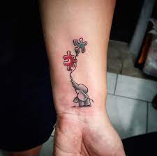 Autism puzzle piece tattoo ideas tattoos designs ideas. 33 Beautiful Tattoos That Bring Awareness To Autism Autism Tattoos Puzzle Tattoos Gorgeous Tattoos