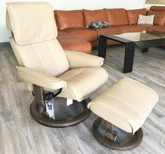 Create an inviting atmosphere with new living room chairs. Stressless Admiral Large Paloma Sand Leather Recliner Chair And Ottoman By Ekornes