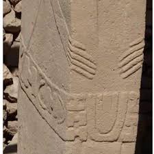 The giant T-shaped stones at Göbekli Tepe were never blank columns, the  central ones are 18ft human figures with carved arms, hands and belts. Long  arms run down their sides and bend