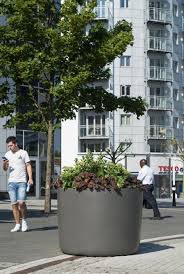 Gunwharf Quays Portsmouth Street And Tree Planters High Performance Composite Planters For Shopping Centres Streetscapes And Planters Tree Planters Street