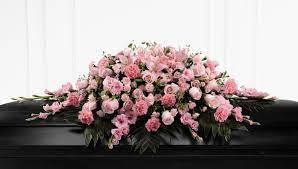 We offer free funeral home delivery with this beautiful standing spray. Ftd Sweetly Rest Casket Spray In Frederick Md Amour Flowers