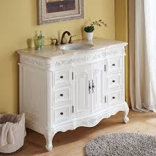In this master bath, a chinese butcher table was repurposed as a textural vanity. Antique Bathroom Vanities Bathgems Com