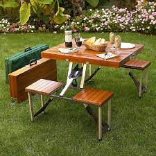 This rectangular picnic table contains two rows of bench seating that collapse into a tabletop for simple transportation. Picnic At Ascot Portable Picnic Table Set Folding Picnic Table Portable Picnic Table Foldable Picnic Table