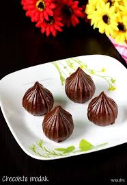 Chocolate Modak Recipe How To Make Chocolate Modak Recipe Modak Recipe Indian Dessert Recipes Doughnut Recipe