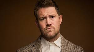 Eddie Perfect unmasks his dark side for the black comedy, The Beast