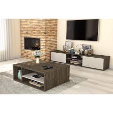 You can get one of those small book case like stands to put your dvd's on, etc and hide them out in another area of your home. Fom 2 Piece Set Including A Tv Stand And A Coffee Table Bestar