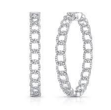 Created in glamorous 14k white gold, each earring features 15, high quality, round diamonds in each hoop. Uneek La Mirada Inside Out Diamond Hoop Earrings In 14k White Gold