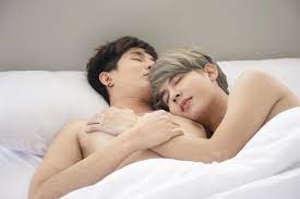 A male couple with an Asian man sleep together in a bed, a symbol of sexual  diversity, expressing openly gay men accepting LGBT concepts. 6783622 Stock  Photo at Vecteezy