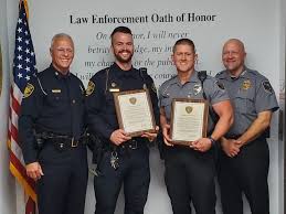 Elon University Campus Police Corporal Ryan Gerner receives lifesaving  award