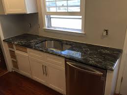 To handle the extra weight from the countertops, your kitchen cabinets might need to be reinforced. Beautiful Black Magic Installation By Our Team At Aa Granite Fabricator Direct Black Magic Kitchen Coun Countertops Granite Countertops Marble Countertops