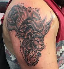 Black and gray half sleeve crown tattoo. African Tattoos Amazing Collection Tattoos For Men And Women