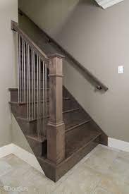 Dark Stained Staircase With Modern Stainless Spindles Staircase Remodel Stained Staircase Staircase Design