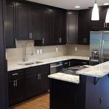 Choosing colors in the same color family is a useful strategy. Dark Cabinets Light Countertops Kitchen Redesign Kitchen Design Modern Small Kitchen Design Small Stained Kitchen Cabinets