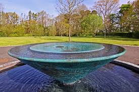 To enter the fountain's chamber, the words inscribed upon the two chalices, aqua de vida, must be spoken. Charybdis Water Sculpture Large Whirlpool Vortex Land8