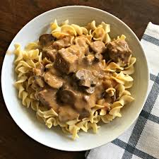 This crock pot beef stroganoff is a simple meal that the whole family will love. Slow Cooker Beef Stroganoff Easy Sweet Little Bluebird