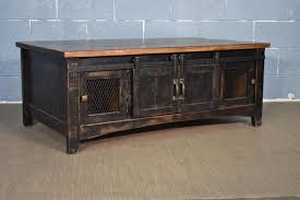 This rectangular budmore table garners attention with its smooth sliding barn doors, distressed rustic finish and black metal accents. Rustic Black Solid Wood Barn Door Coffee Table Identical On Both Sides By Rusticshop1 From Rustic Shop Of Chicago Il Attic