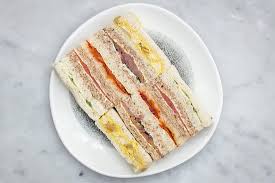 Smoked salmon mingles with capers, red onion, and horseradish in this cream cheese dip. British Afternoon Tea Sandwiches Coronation Chicken Roast Beef Watercress Horseradish And Mustard Dried Semi Dried Tomato And Basil V Cucumber Cream Cheese And Mint V Smoked Salmon Creme Fraiche Picture