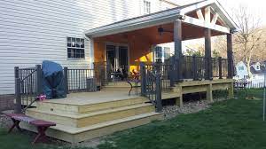 Extending gable roof over deck. Rustic Open Concept Wood Deck With Metal Railings And A Gable Roof Extreme Decks Pergola Ideas For Patio Pergola Gable Roof Design