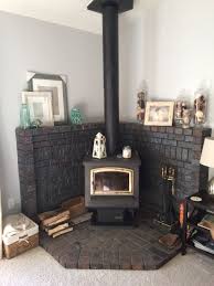 Fire in stove, close up, firewood burning. Updated Look On A Corner Wood Burning Stove Fireplace Mantel Wood Stove Fireplace Stove Decor Wood Stove Decor